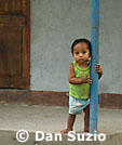 Child on porch, Timor-Leste